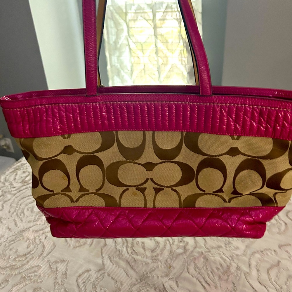 Coach purse. Cute Coach pattern with pink.